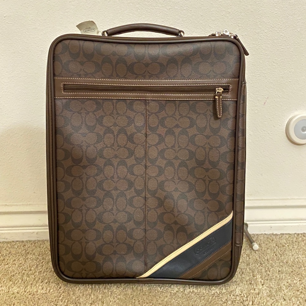 SOLD: Coach Small Wheel Along Suitcase